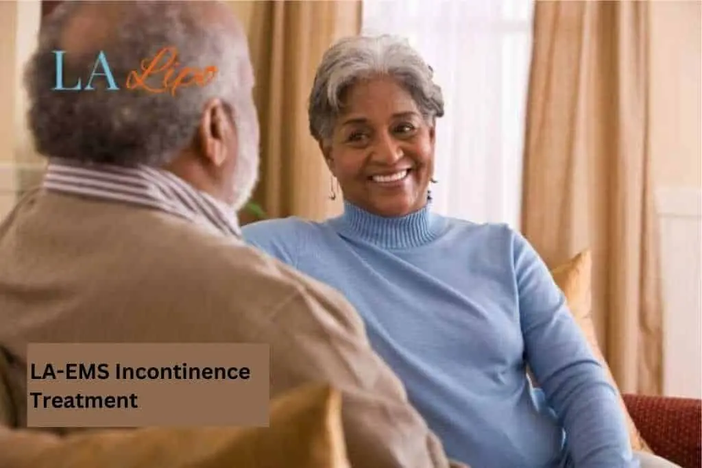 Couple sat smiling at each other - LA-EMS treatment Enfield Island Village